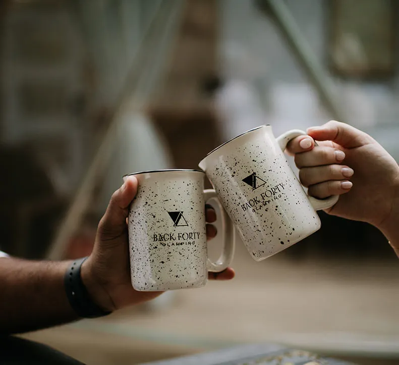 Couple Holding B40 Mugs