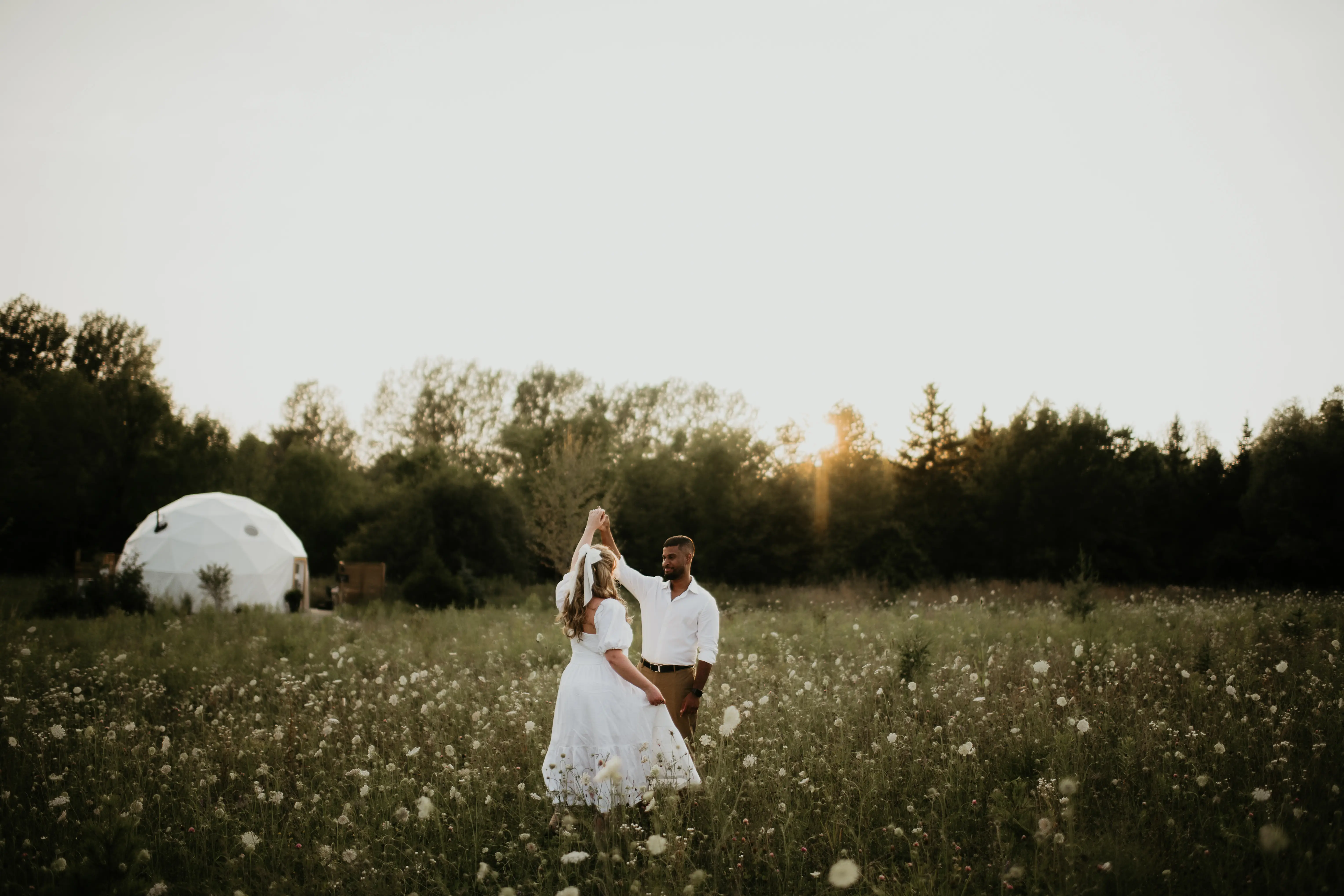 Couple At Sunset By The Domes