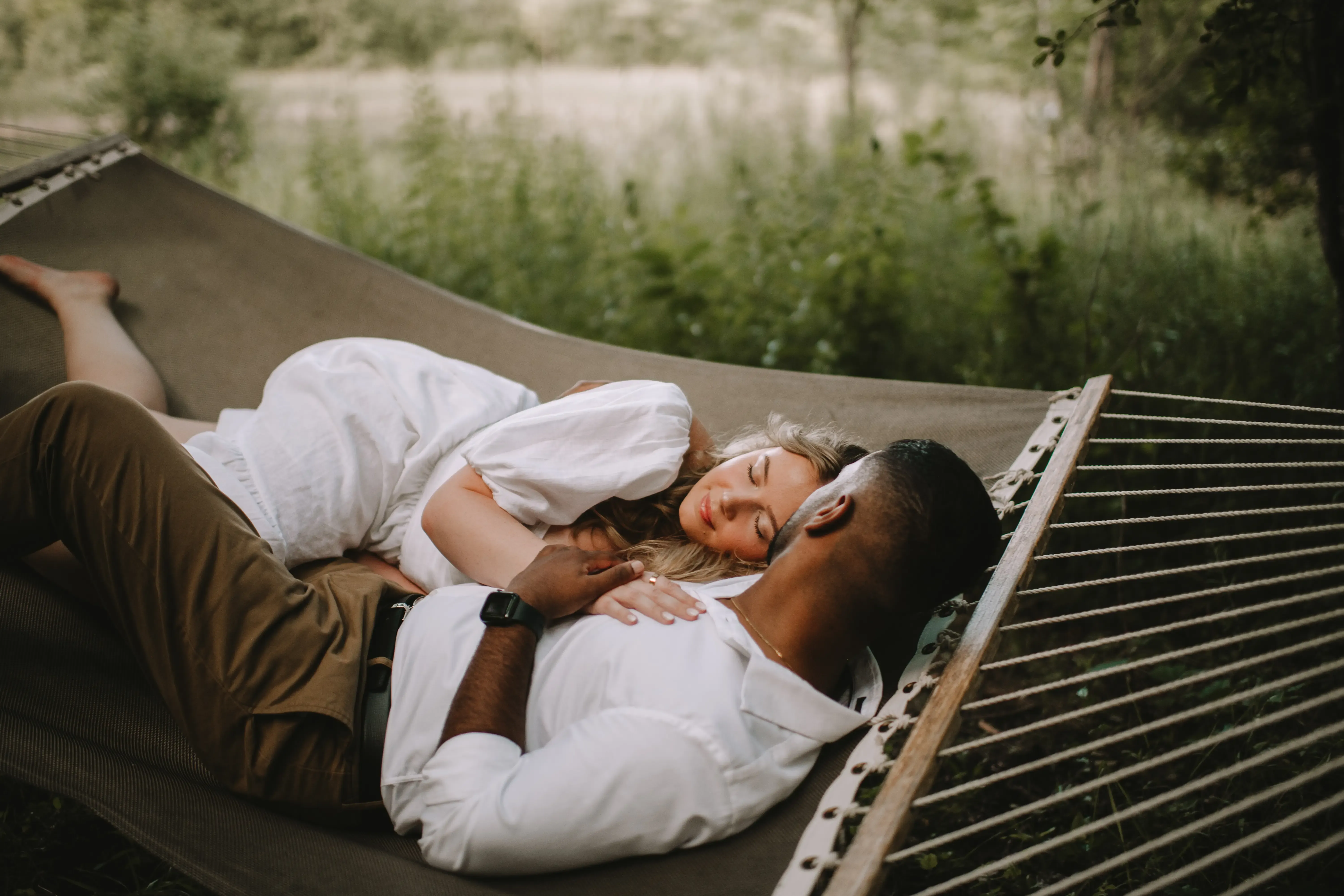Couple Relaxing In A Hammock