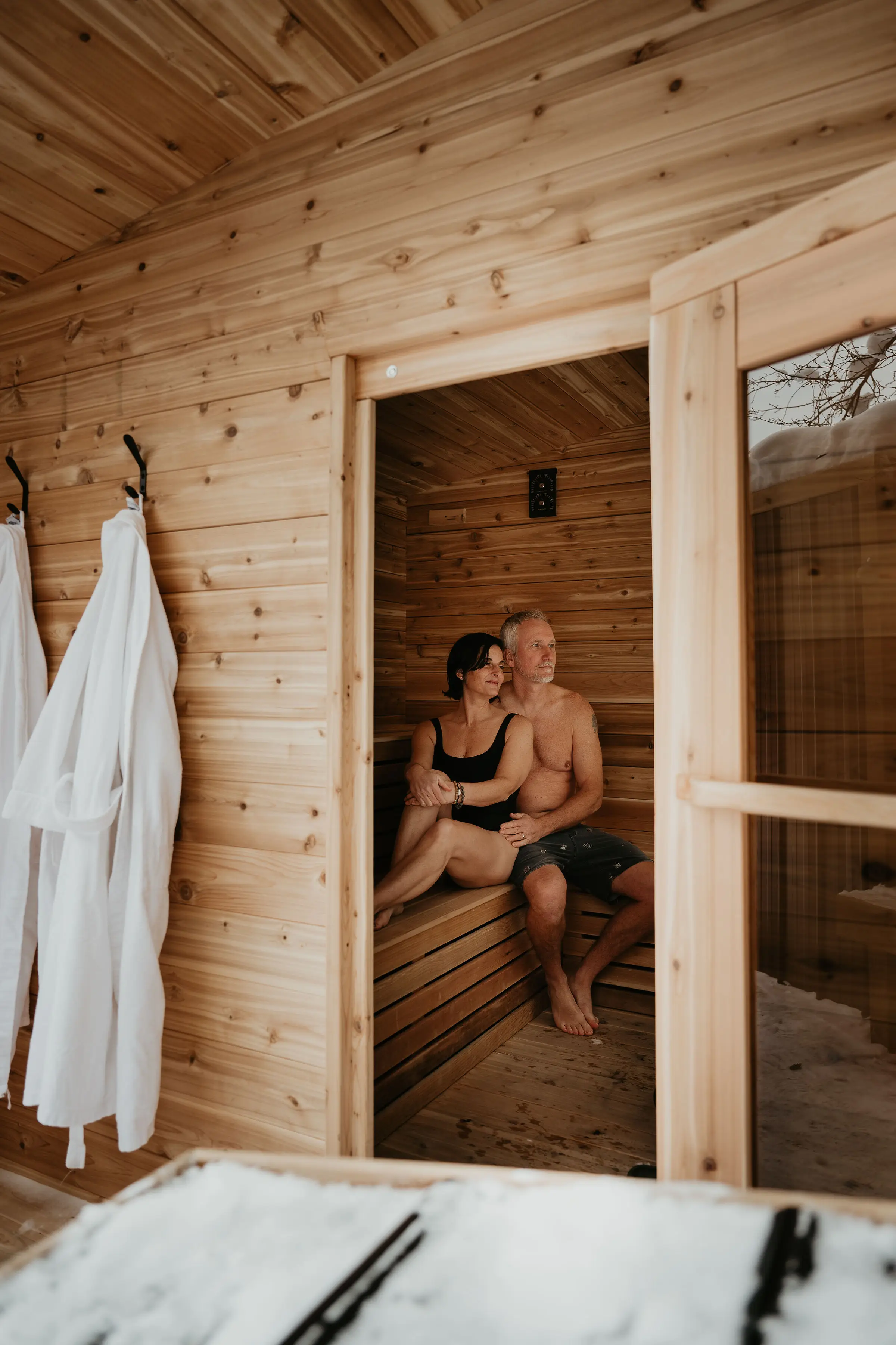 Couple Relaxing In The Sauna